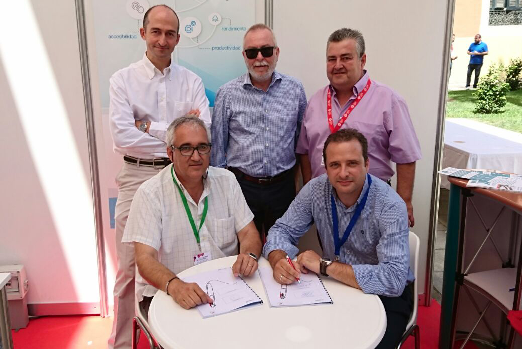 Firma con Costa de Huelva
